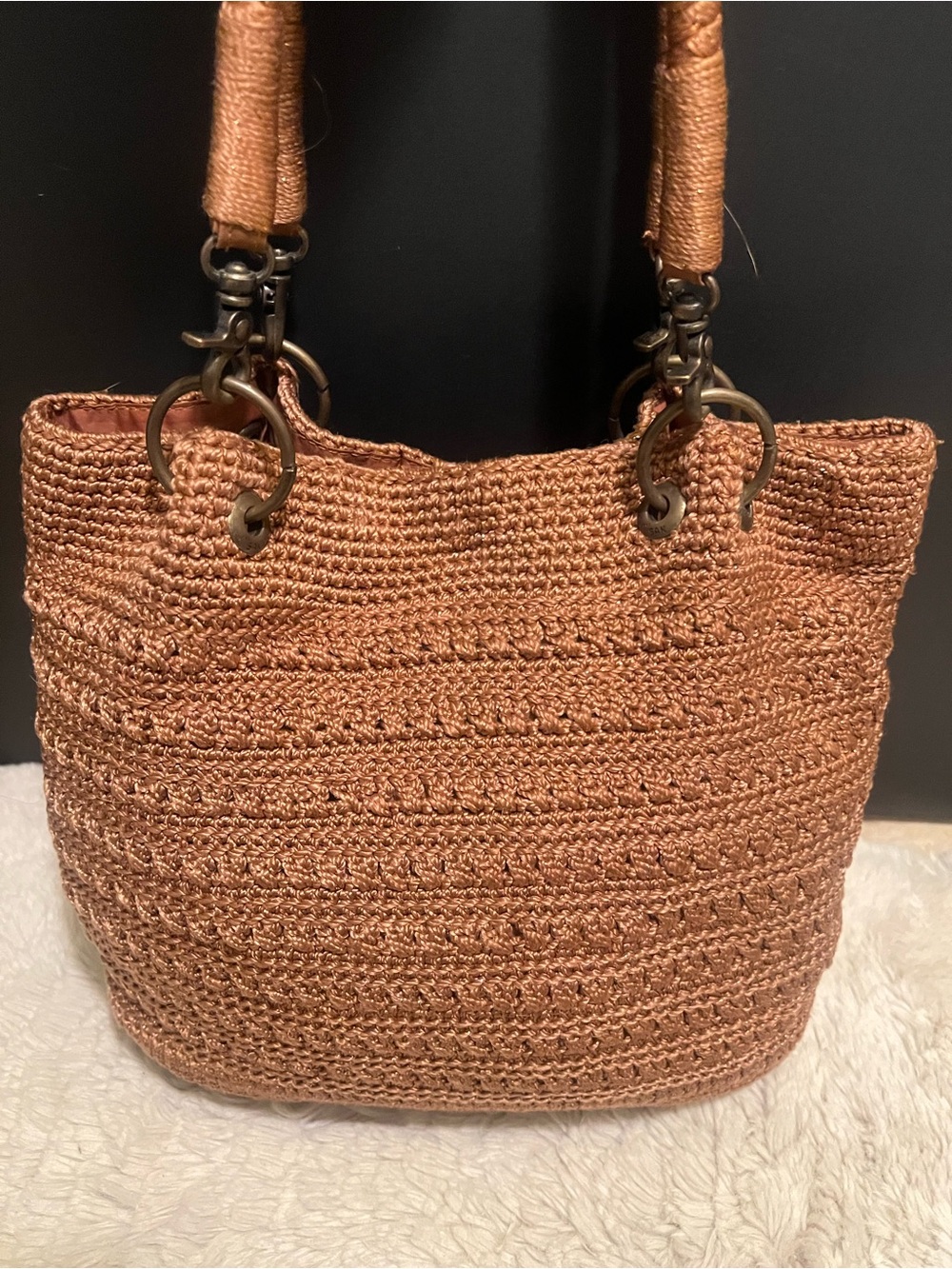 Vintage The Sak brown woven handbag.